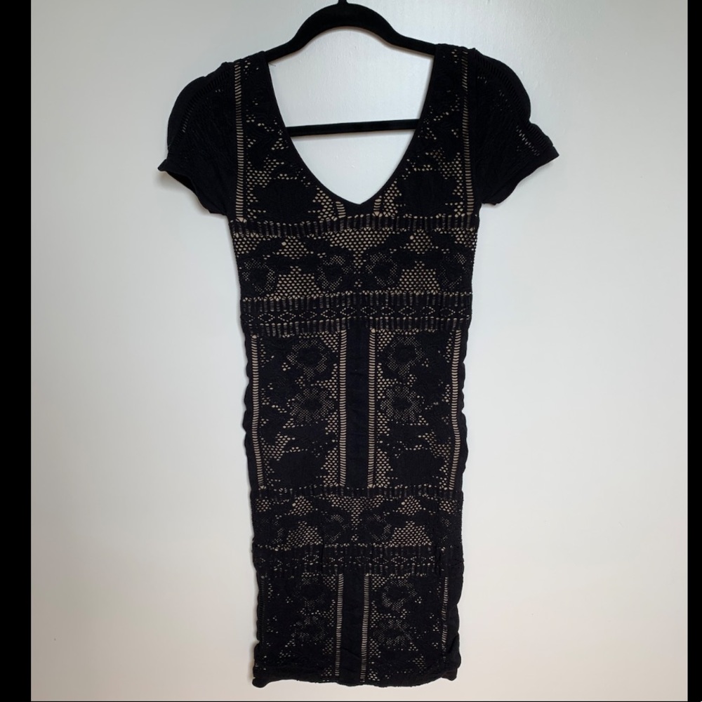 Bebe black over nude dress